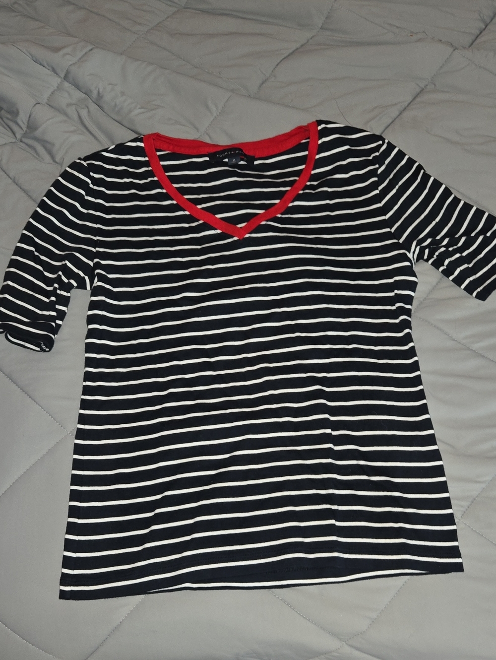 Tommy Hilfiger Black and White Striped V‑Neck Tee with Red Trim